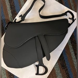 Incredibly Stylish Black Dior Saddle Bag with Matte Black Hardware